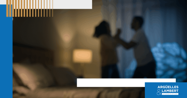 Blurred image of a domestic dispute between two adults inside a home, representing family violence allegations and legal issues in Texas