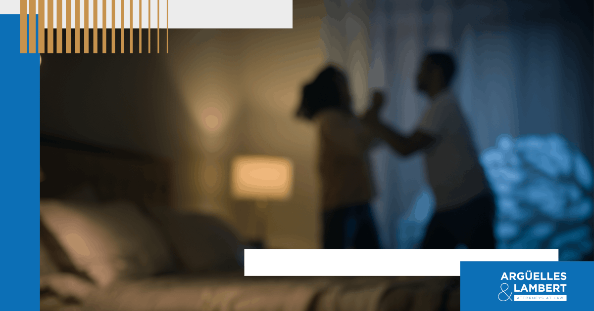 Blurred image of a domestic dispute between two adults inside a home, representing family violence allegations and legal issues in Texas
