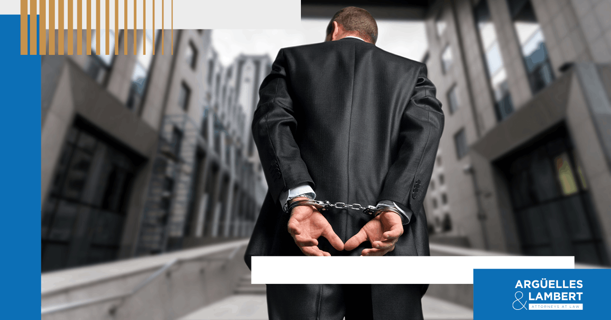 Business professional in handcuffs representing white collar crime charges and criminal penalties in Texas